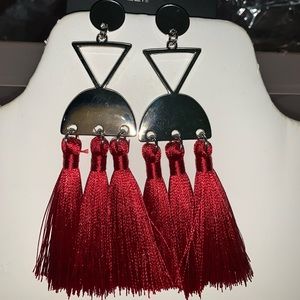 Beautiful red tassels with a silver setting